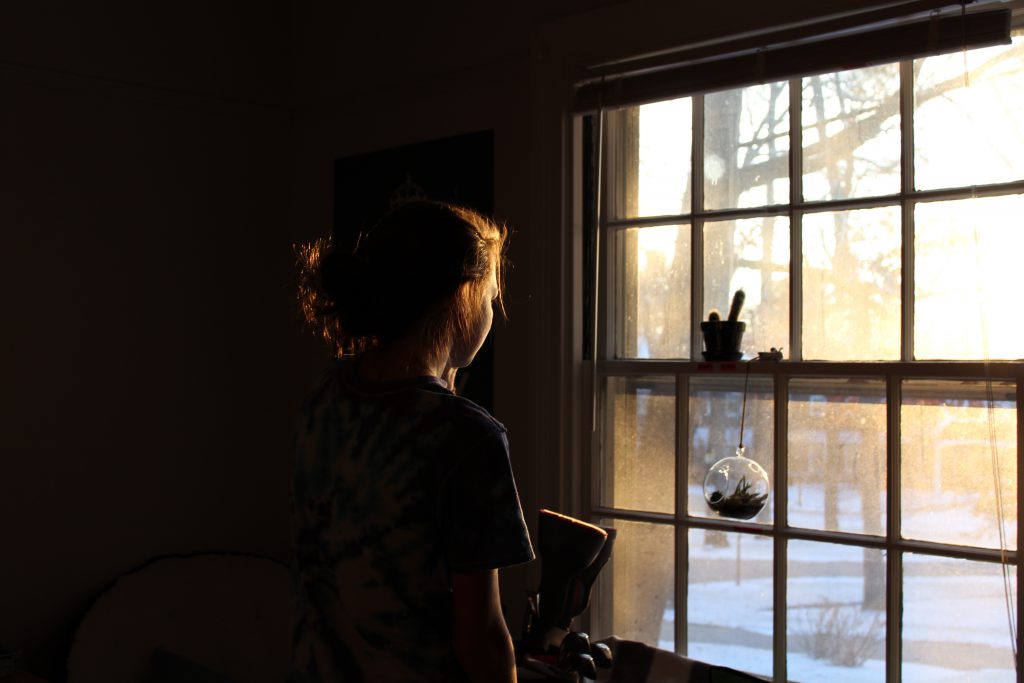 child looking outside